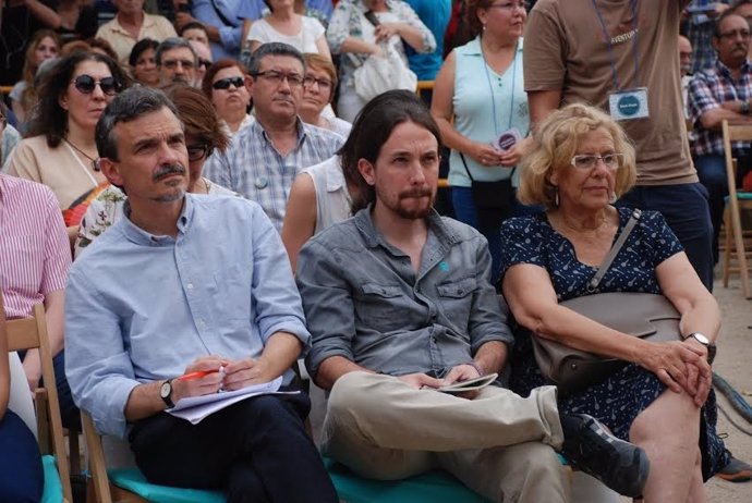 Carmena, Iglesias y López en un acto en Madrid