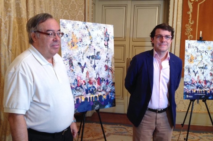 El autor del cartel (I) y el alcalde (D)