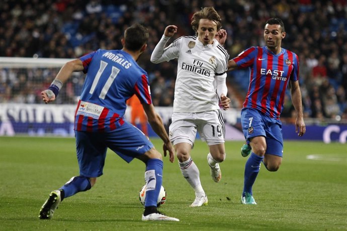 Luka Modric, José Luis Morales y David Barral Torres