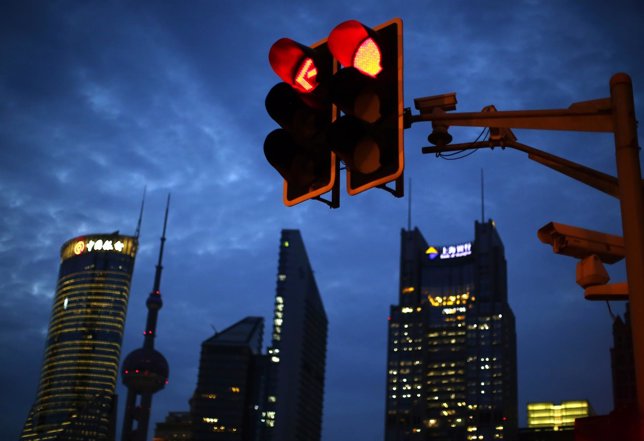 Traffic lights are seen at the Pudong financial district in Shanghai