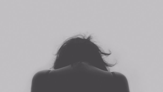 Mujer con dolor, depresión