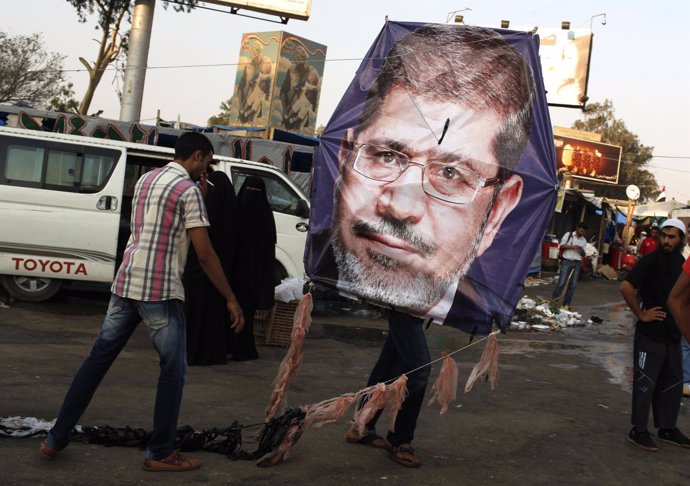 Supporters of deposed Egyptian President Mursi fly a kite in the sit-in area of 