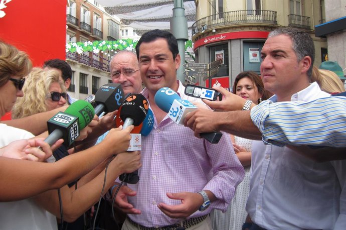 De la Torre, Juanma Moreno y Elías Bendodo en la Feria de Málaga