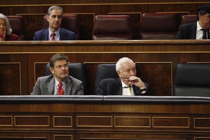 Rafael Catalá y José Manuel García Margallo en el Congreso.