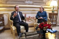 Merkel y Holland abordarán las cuotas de inmigrantes en la reunión de este lunes