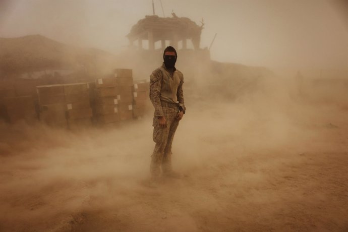 PFC. Voris stands during a sandstorm in southern Afghanistan's Helmand province