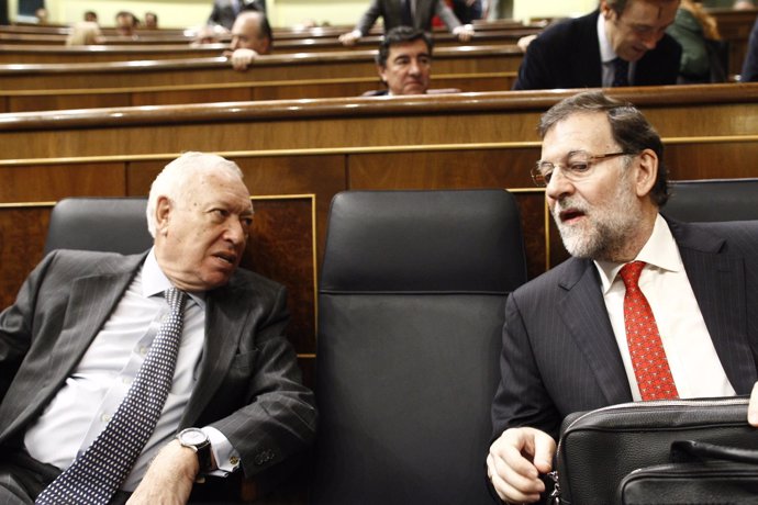 José Manuel García Margallo y Mariano Rajoy.