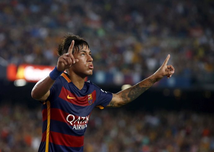 Barcelona's Neymar celebrates a goal against AS Roma during a friendly match at 