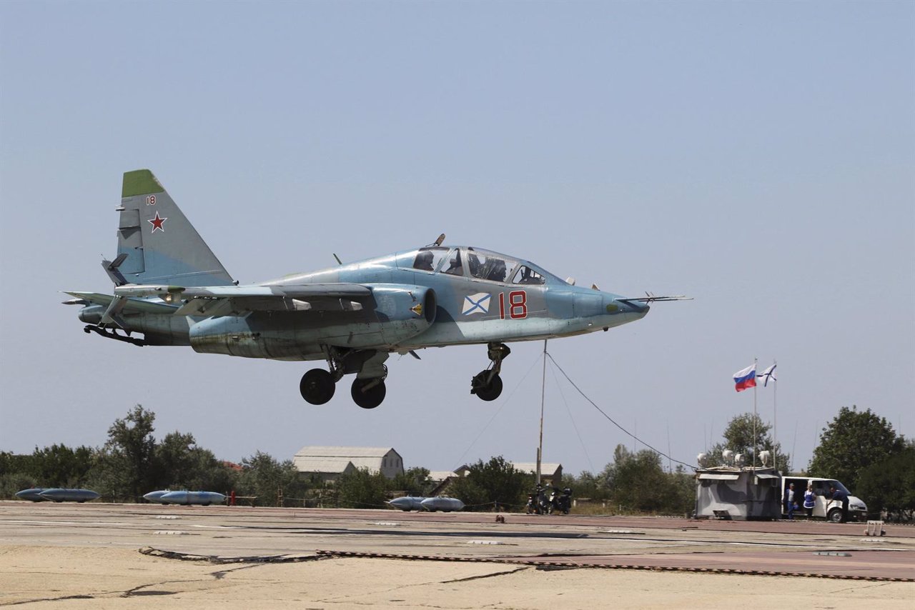 A Russian Sukhoi Su-25 jet fighter flies during a drill at the Nitka training co