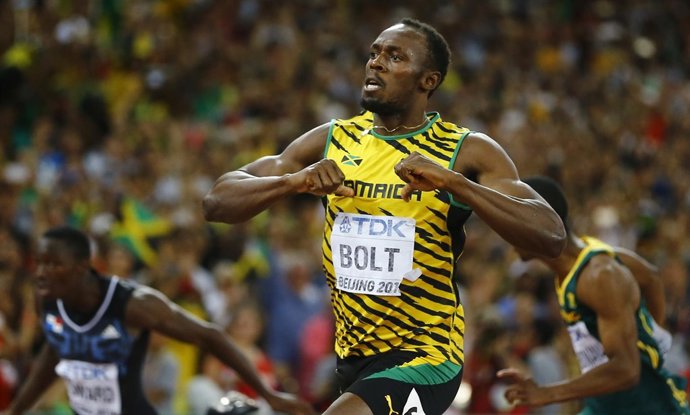 Usain Bolt of Jamaica celebrates winning the men's 200 metres final during the 1