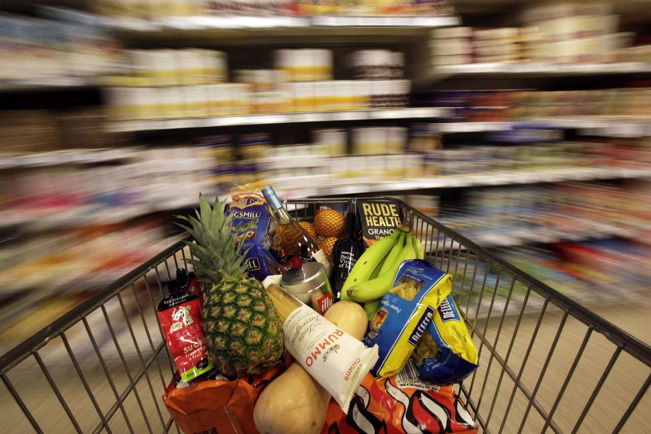 A shopping trolley is pushed around a supermarket in London