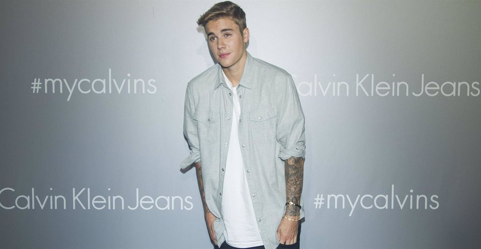 HONG KONG - JUNE 11:  Justin Bieber poses on the red carpet at the Calvin Klein 