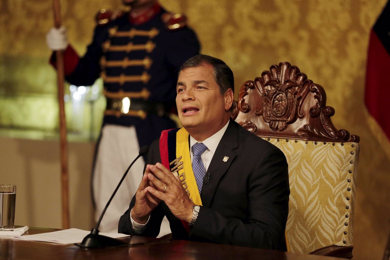 Ecuadorean President Rafael Correa gestures as he addresses a television 