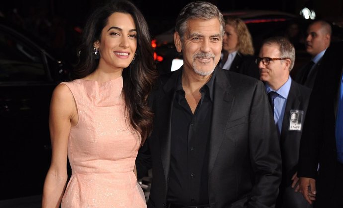 Amal Alamuddin Clooney, George Clooney at arrivals for OUR BRAND IS CRISIS Premi