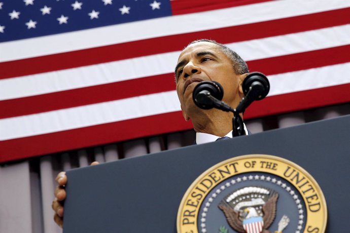 Obama pauses during remarks on a nuclear deal with Iran at American University i