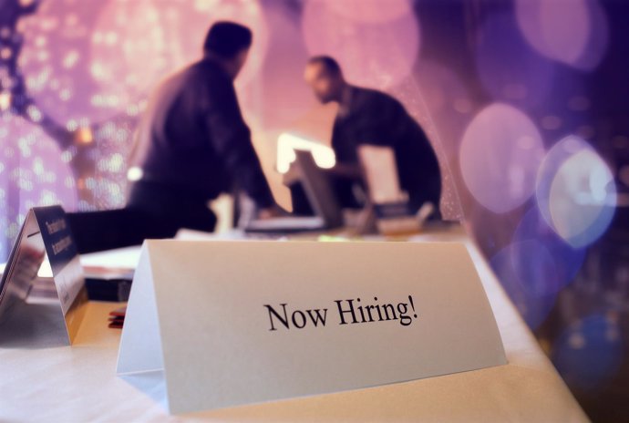 SAN FRANCISCO - MARCH 19:  A "now hiring" sign is posted on a table during the R