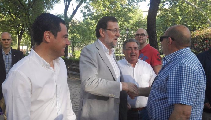 Juanma Moreno, Rajoy y Zoido en Sevilla.