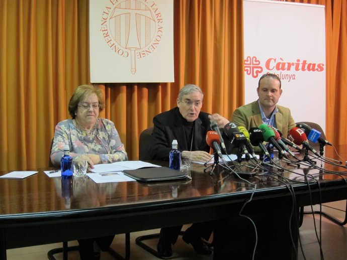 La presidenta de Càritas Catalunya, Carme Borbonès y el cardenal Sistach 