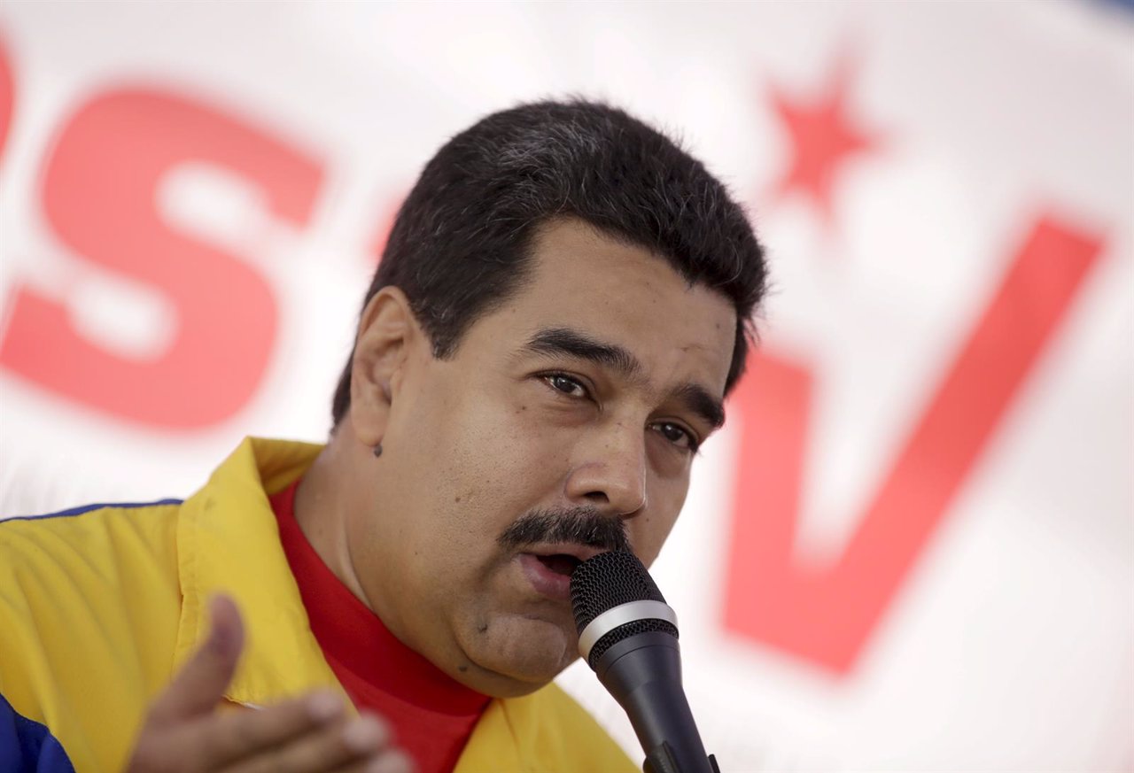 Venezuela's President Nicolas Maduro speaks in a news conference after voting in