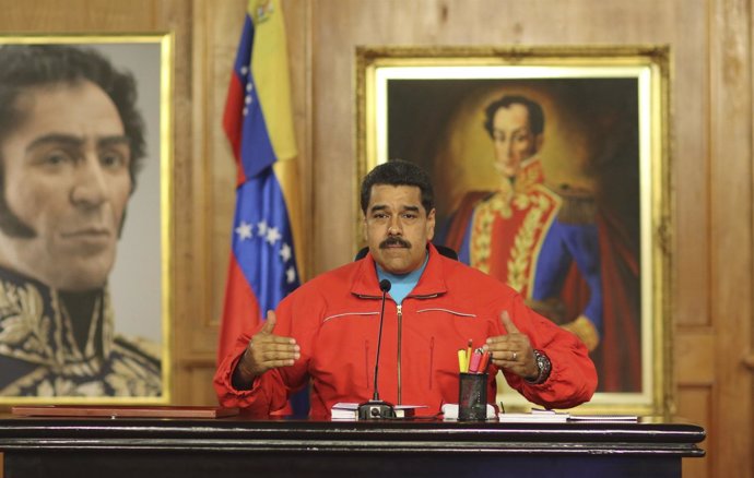Venezuela's President Nicolas Maduro talks to the media during a news conference