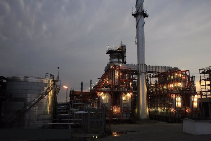 A storage tank and a processing plant are seen at the Miguel Hidalgo refinery in