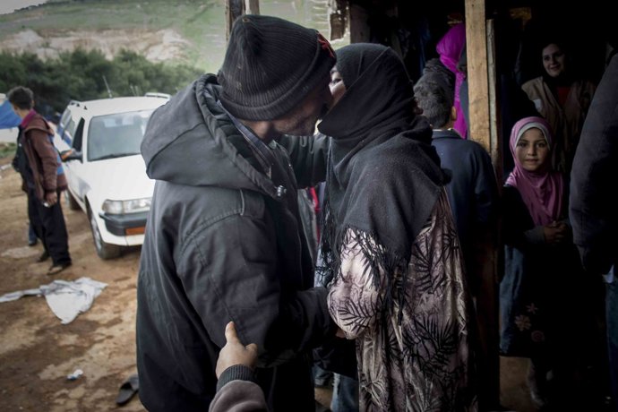 Refugiados, beso