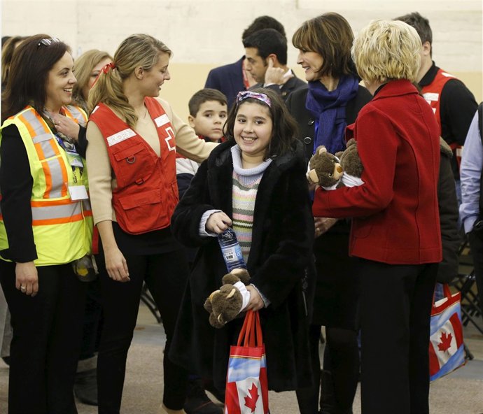 Refugiados sirios llegan a Montreal, en Canadá