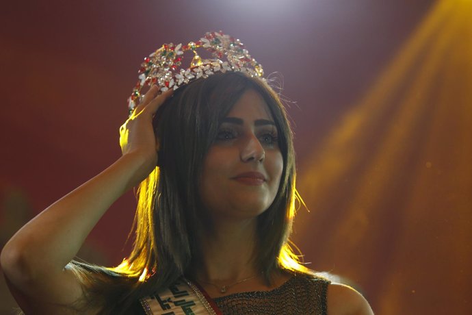 Miss Iraq Shaima Qassem reacts during the Miss Iraq Pageant in Baghdad