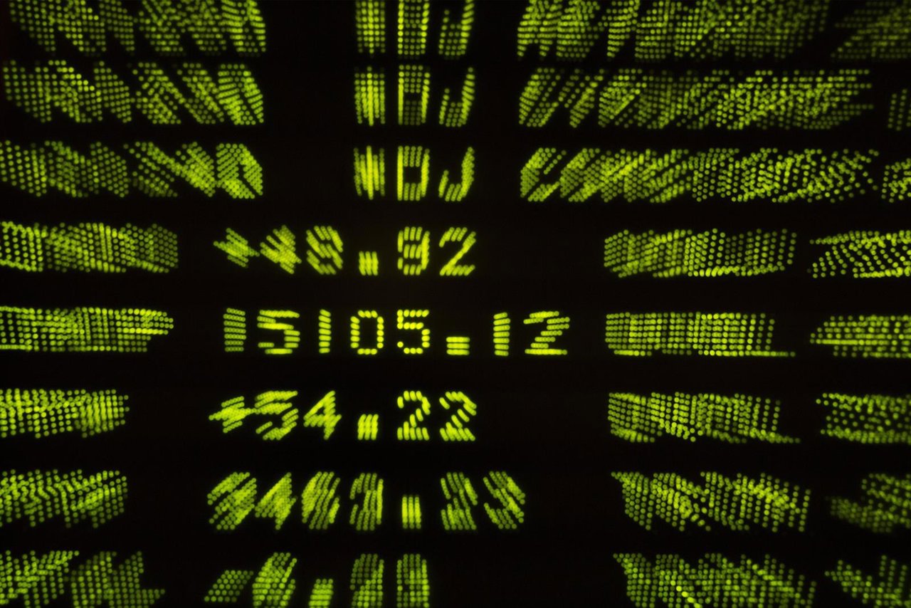 A screen displays the final tally for the Dow Jones industrial average at the Ne