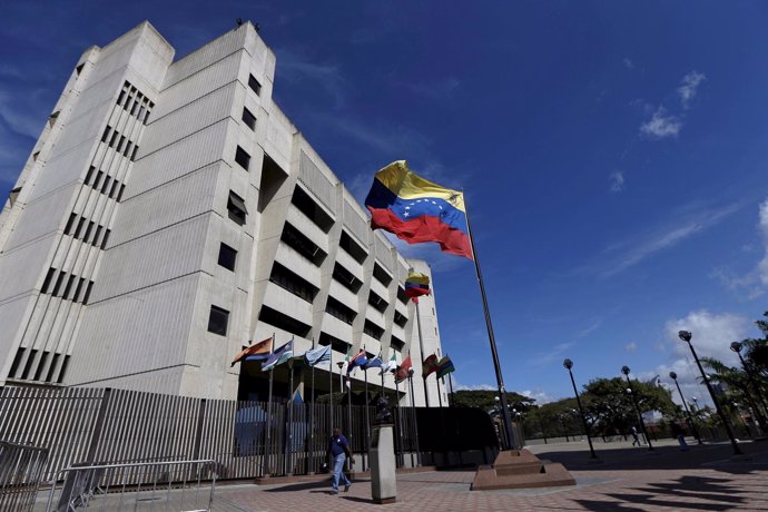 A man walks in front of a building of the Venezuela Supreme Court in Caracas