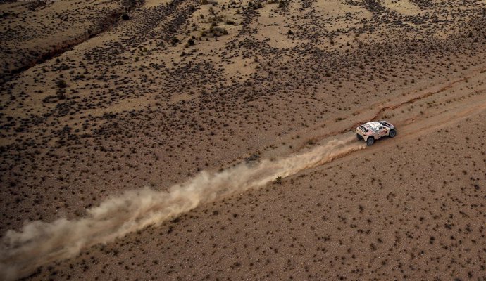 Loeb of France drives his Peugeot during the fifth stage Jujuy-Uyuni of the Daka
