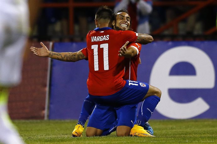 Chile's Valdivia celebrates with teammate Vargas after scoring a goal during a f