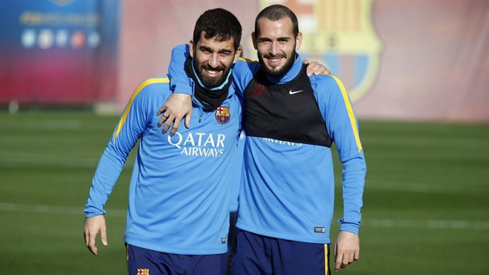 Arda Turan y Aleix Vidal
