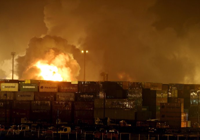 Fire rises from chemical containers from logistic company Localfrio in Guaruja