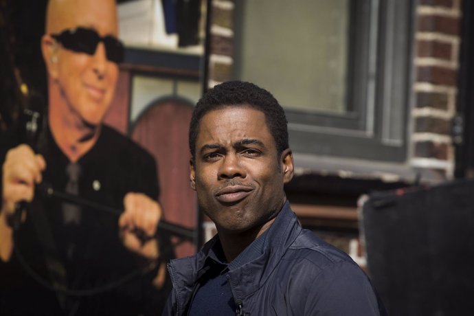 Comedian Chris Rock arrives at the Ed Sullivan Theater in Manhattan to take part