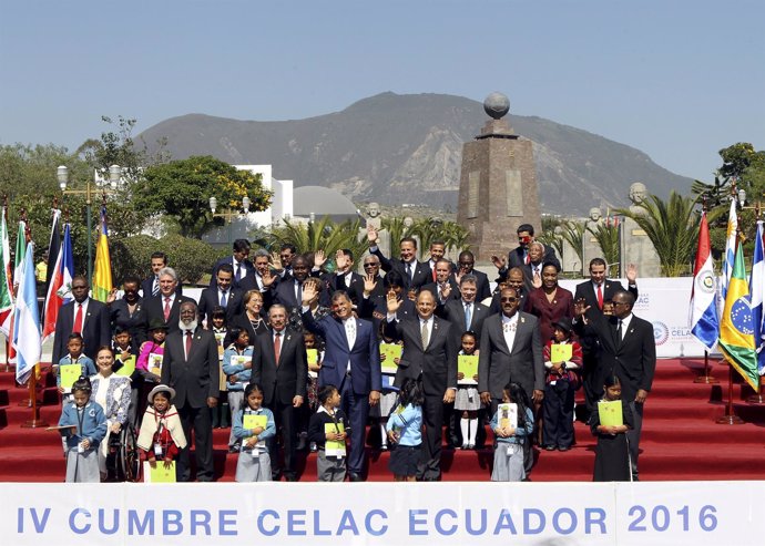 Heads of state and government pose for an official photograph during the Communi