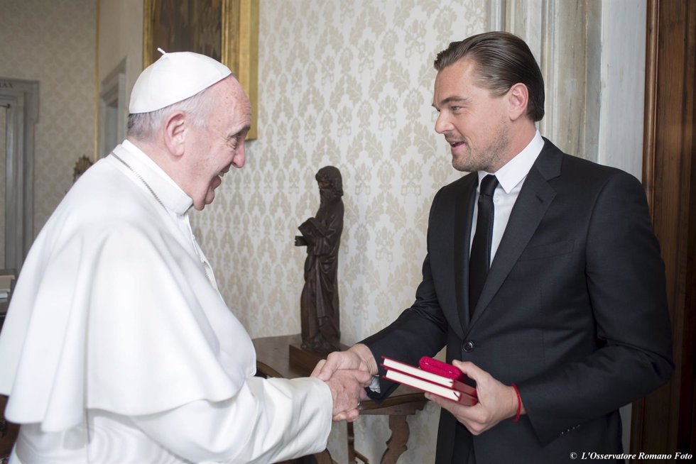 Pope Francis shakes hands with actor Leonardo DiCaprio at the Vatican