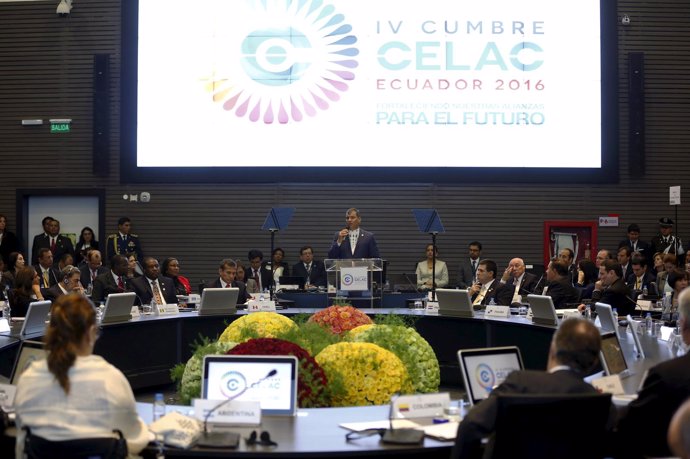Ecuador's President Rafael Correa addresses the audience at the Community of Lat