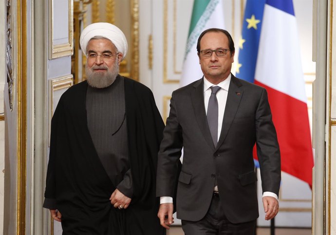 El presidente francés, François Hollande, y su homólogo iraní, Hasán Rohani