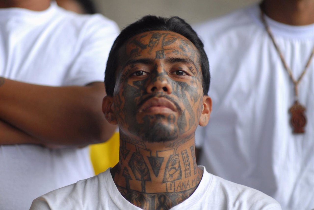 A gang member attends a mass at the prison of Izalco, about 65 km (40 miles) fro