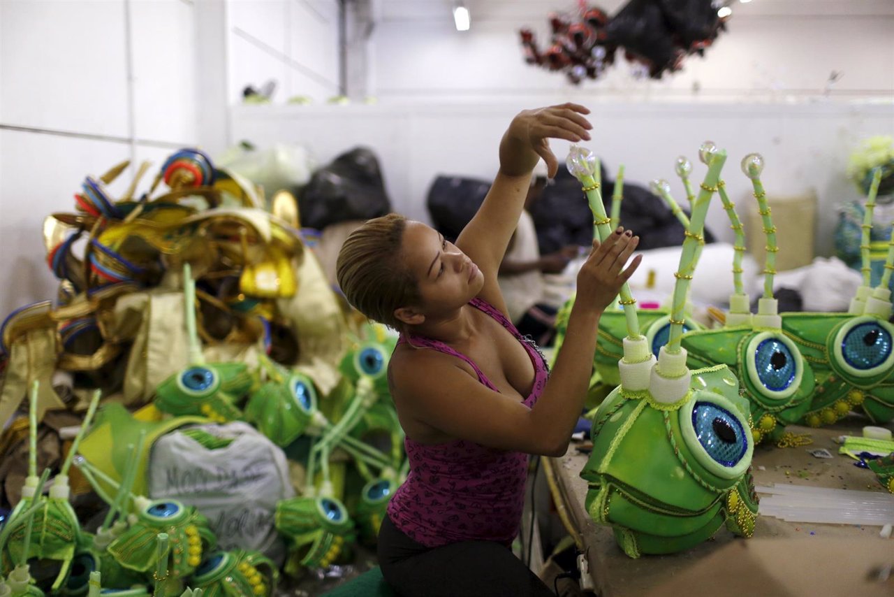 A worker prepares a carnival costume at the Mocidade Independente Samba school i