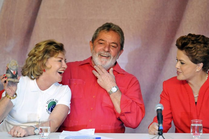 Brazil's first lady Leticia talks with her husband Brazil's President Lula da Si