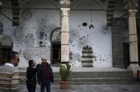 Davutoglu promete que reconstruirán Sur como se hizo con Toledo