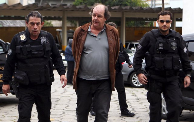 Zelada, former director of Petrobras' international division, is escorted by fed