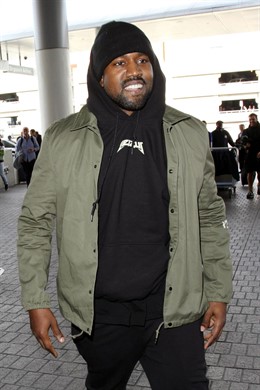 Kanye West spotted in his own Yeezy designs as he arrives at LAX