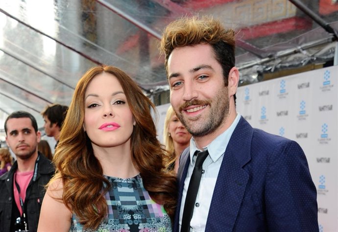 HOLLYWOOD, CA - APRIL 12:  Actress Rose McGowan (L) and Davey Detail arrive at t