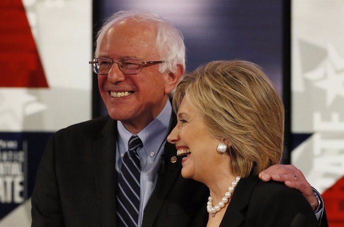 Democratic U.S. Presidential candidate Clinton shares a laugh with Sanders at th