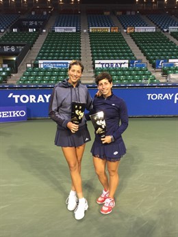 Garbiñe Muguruza y  Carla Suárez 