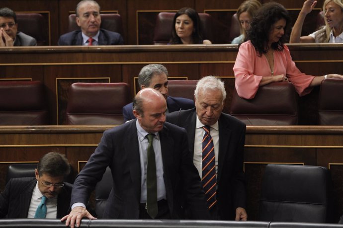 Luis de Guindos y José Manuel García-Margallo en el Congreso