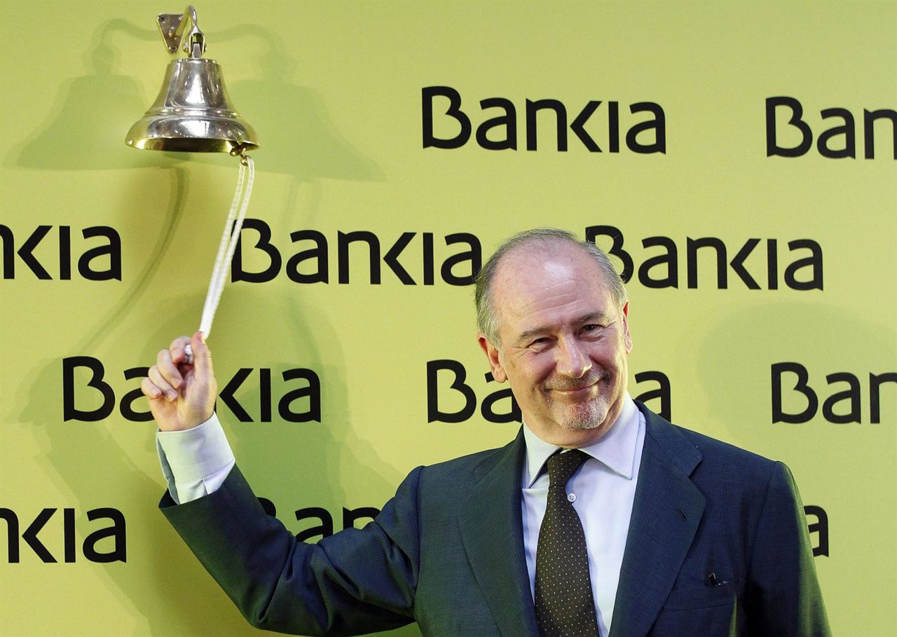 Rodrigo Rato, chairman of Spanish savings bank Bankia, rings a bell during its b